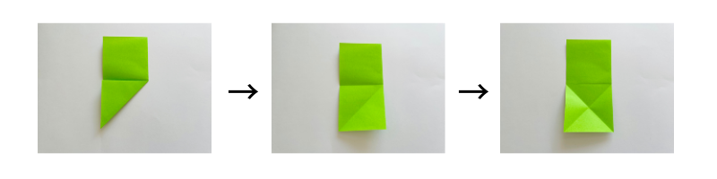 折り紙を真ん中の線に合わせて下半分を三角に折り、開く。折り目が×(バツ)になるように反対側も折る。